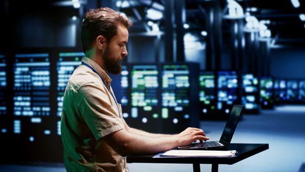 Man working in a server room