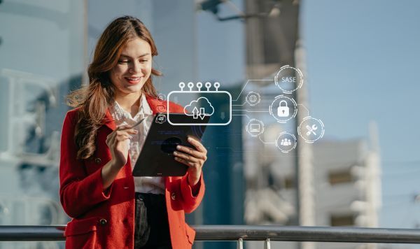 Woman using a tablet to access the cloud